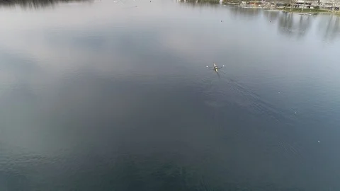 Aerial view of rowing boat training on a pond Stock Footage 106400621