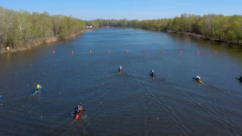 Aerial view of rowing competition in the rowing channel Stock Footage 107375441