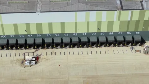Aerial View of Rows of Loading Bays at Modern New Build Logistics Distribution Video stock 342855670