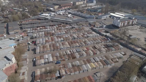 Aerial view. Rows of old rusty car garages. 4K. Stock Footage 127929731