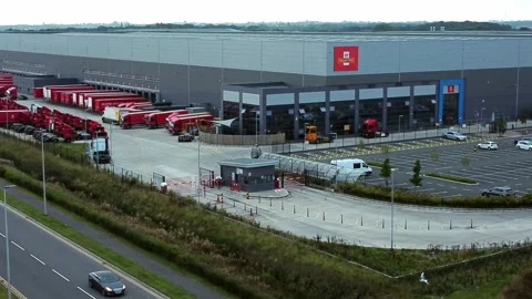 Aerial view royal mail parcel service hub Warrington England rising shot Stock Footage 162258959
