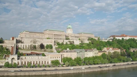 Aerial view of the Royal Palace overlooking the Danube river in Budapest - drone Stock-Footage 99340077