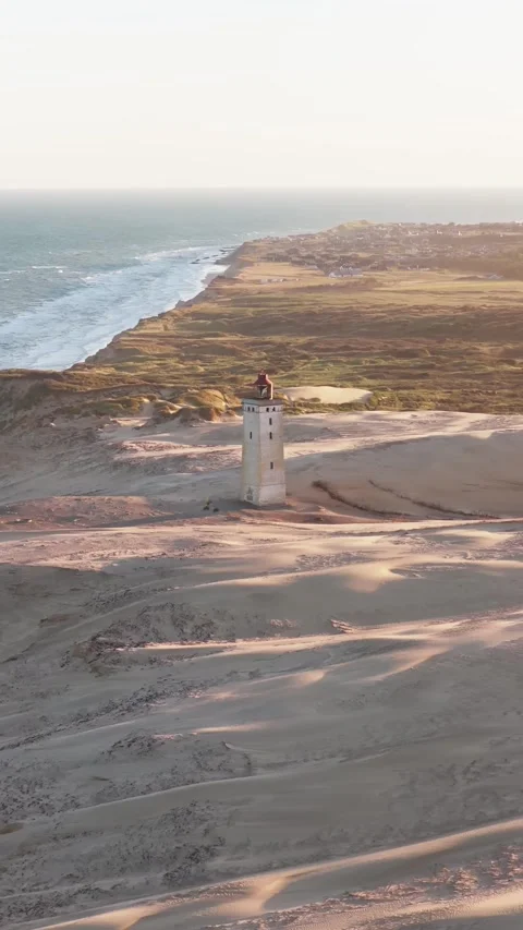 Aerial view of Rubjerg Knude Lighthouse, Denmark. Stock Footage 317080359