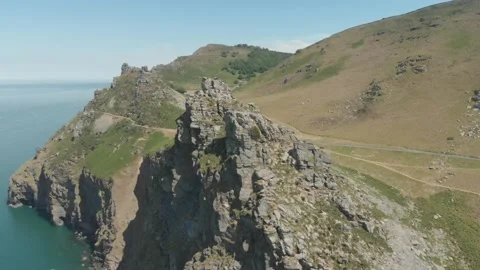 Aerial view of the rugged cliffs &amp; coastline in Exmoor National Park, Devon Stock Footage 132015883