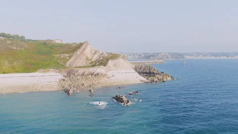 Aerial view of the rugged coastline at Cap dErquy, Brittany, France, showing Stock Footage 346673196