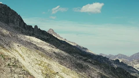 Aerial view of rugged mountain peaks with shadows Stockbeeldmateriaal 344652195