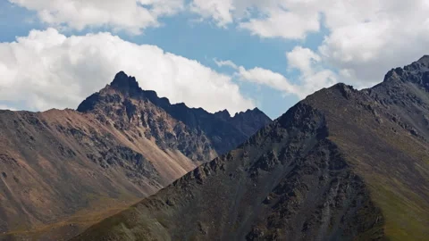 Aerial View of Rugged Mountain Range in Kyrgyzstan with Parallax Motion Video stock 304981164