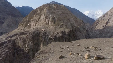 Aerial view of a rugged mountain range in Pakistan, highlighting the stark Stock Footage 314455651