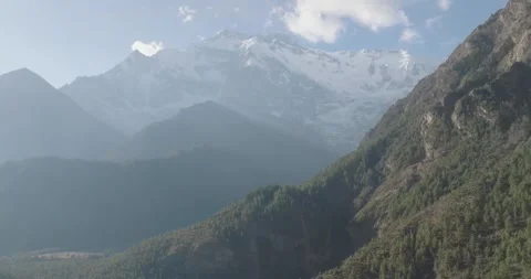 Aerial View of Rugged Mountain Valleys in the Himalayas Stock Footage 319476993