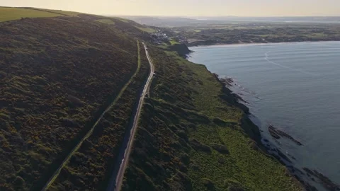 Aerial View of Rugged North Devon Coast Near Saunton Sands, England Stock Footage 333344847