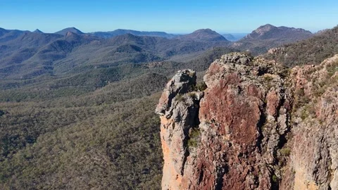 Aerial View of Rugged Rock Formations in Warrumbungle National Park Vídeos de archivo 341395621