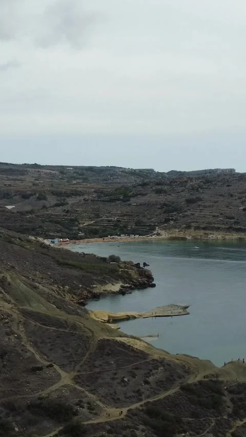 Aerial view of rugged white limestone cliffs and turquoise Mediterranean se.. Stock Footage 327034936