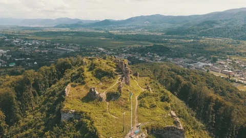 Aerial View of The Ruins of Castle on Mountain 4K Stock Footage