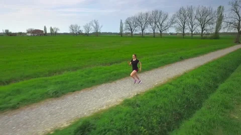 Aerial view of a runner Stock Footage 61913390