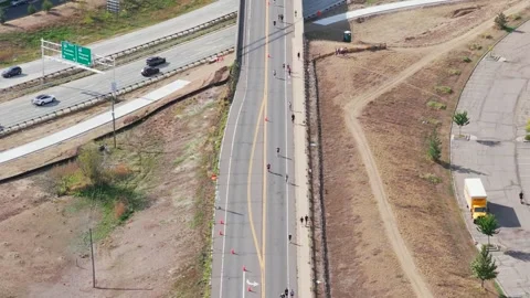 Aerial view of runners on a road in Boulder, United States. Stock Footage 346591087