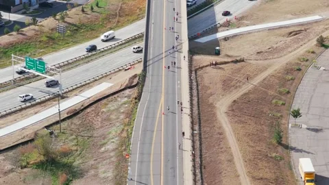 Aerial view of runners on a road in Boulder, United States. Stock Footage 346591124