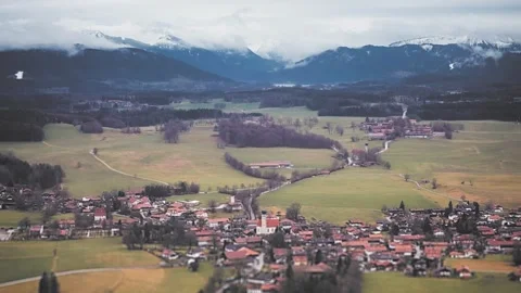 An aerial view of rural Bavaria. A patchwork of farm fields and small Vídeos de archivo 274183233