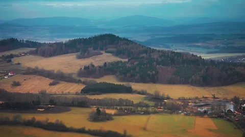 Aerial view of rural Czechia. A patchwork of forests, fields, and small Stock Footage 267079272