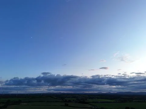 Aerial View of Rural Fields Under Blue Cloudy Sky 스톡 사진