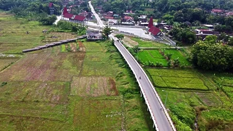 Aerial View of Rural Landscape with Fields and Bridge Video stock 280454130