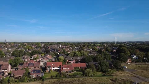 Aerial view of rural landscape with fields and forest under blue sky Stock Footage 327327049
