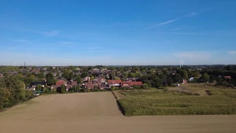 Aerial view of rural landscape with fields and forest under blue sky 库存影片 327327170