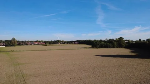 Aerial view of rural landscape with fields and forest under blue sky 库存影片 327328461