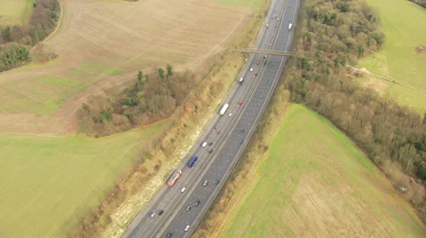Aerial view rural Motorway England, UK Stock Footage