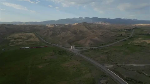 Aerial view of a rural road intersection in Naryn, Kyrgyzstan Video stock 347073760