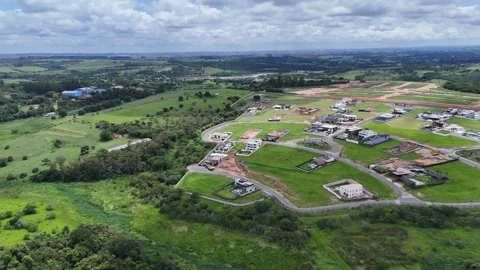 Aerial View of Rural Roads, Fields and Distant City Stock Footage 325810862