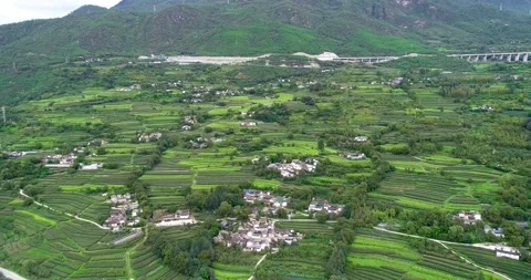 Aerial View of Rural Terraced Fields in Lijiang Yunnan China 動画素材 336882321