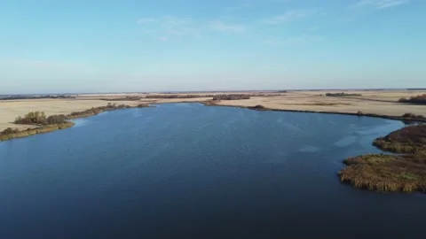 Aerial view of rural wetlands, Saskatchewan Stock Footage 219106906