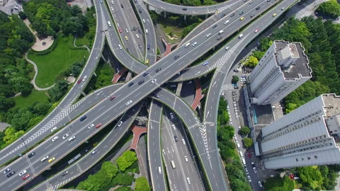 Aerial View of Rush Hour Traffic on Multiple Highways and Flyovers Stock Footage 87310321