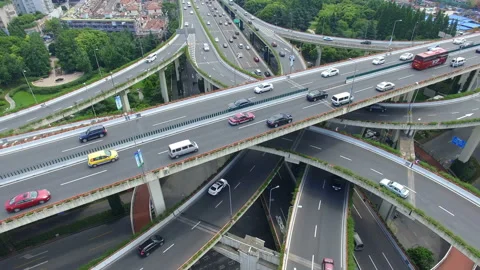 Aerial View of Rush Hour Traffic on Multiple Highways and Flyovers Stock Footage 87313398