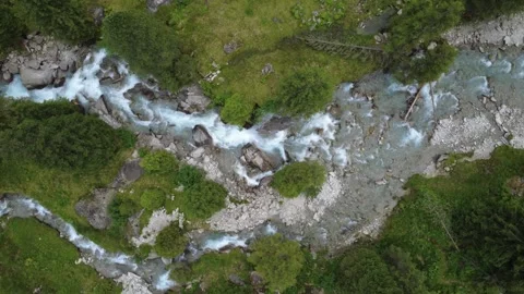 Aerial View of a Rushing Mountain River in the Austrian Alps in Summer Stock Footage 327728296