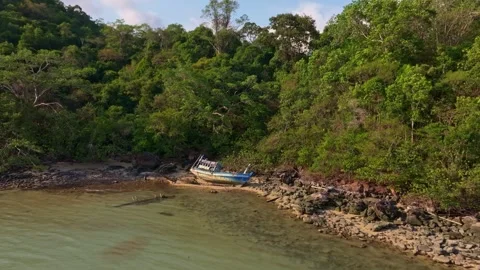 Aerial view of rusted vessel stranded on sandy shore, Koh Kood, Thailand Stock Footage 310523622