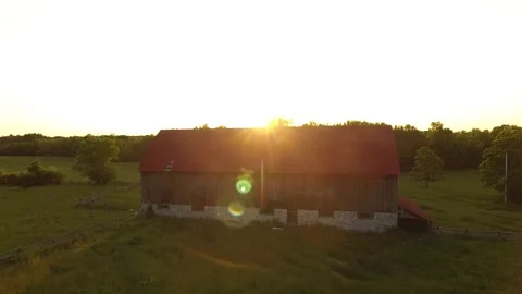 Aerial View of Rustic Barn at Sunset in Rural Countryside Stock Footage 327230001