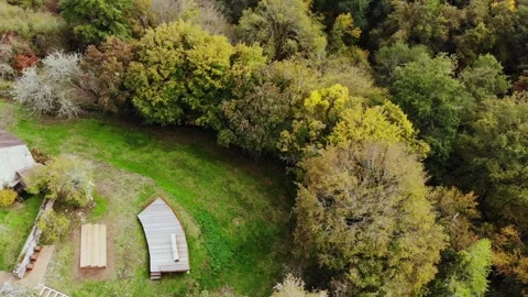 Aerial view of Saint-Mayeul chapel in Troncais forest, Allier, France Stock Footage 341769356