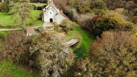 Aerial view of Saint-Mayeul chapel in Troncais forest, Allier, France Stock Footage 341769369