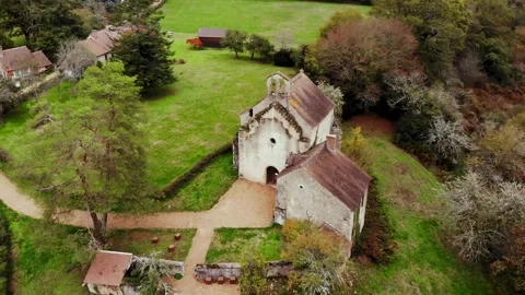 Aerial view of Saint-Mayeul chapel in Troncais forest, Allier, France Stock Footage 341769371