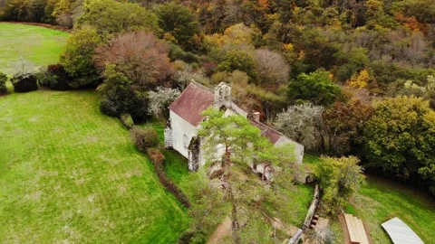 Aerial view of Saint-Mayeul chapel in Troncais forest, Allier, France Stock Footage 341769377