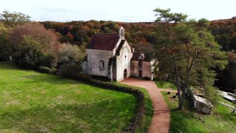 Aerial view of Saint Mayeul chapel hidden in Troncais forest, Vitray, France Stock Footage 341884842