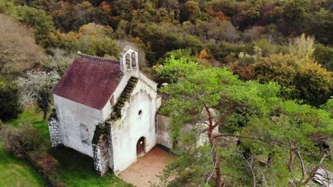 Aerial view of Saint Mayeul chapel hidden in Troncais forest, Vitray, France Stock Footage 341884845