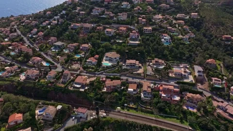 Aerial view of Saint-Raphael rooftops near calm Mediterranean waters Stock Footage 310640018