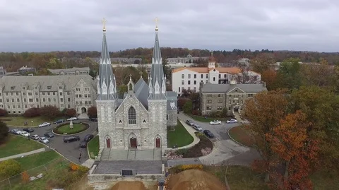 Aerial view of the Saint Thomas of Villanova Church on the Villanova University Stock Footage 81980164