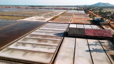 Aerial view of salt fields of kampot, cambodia. Geometric evaporation ponds Stock Footage 326112093