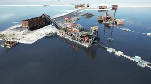 Aerial view of salt mining operation at Chaka Salt Lake in Qinghai China 動画素材 346649791