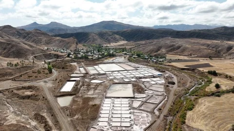 Aerial view of the salt pans inside the village 3 Stock Footage 294086165