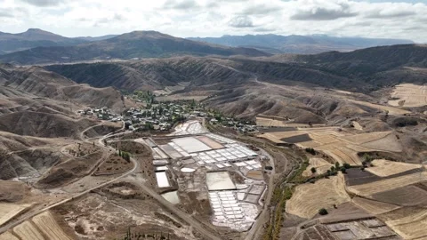 Aerial view of the salt pans inside the village 2 Stock Footage 294086188