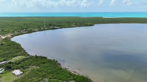 Aerial view of the Salt trading post and lagoon in Exuma, The Bahamas. Stock Footage 336422507